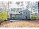 Gray house exterior with backyard and patio at 6179 Dana Ct, Lithonia, GA 30058