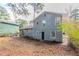 Gray house exterior with backyard and patio at 6179 Dana Ct, Lithonia, GA 30058