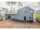 Gray house exterior with backyard and patio at 6179 Dana Ct, Lithonia, GA 30058