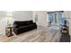 Inviting living room with hardwood floors, neutral colors, and natural light at 1608 Vicksburg Pl, Sandy Springs, GA 30350
