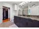 Modern bathroom with granite vanity and walk-in closet at 250 Pharr Rd # 1707, Atlanta, GA 30305