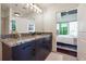 Modern bathroom with granite countertops and a view of bedroom at 250 Pharr Rd # 1707, Atlanta, GA 30305