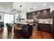 Modern kitchen featuring granite countertops, stainless steel appliances, and an island with seating for casual dining at 250 Pharr Rd # 1707, Atlanta, GA 30305