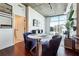 Open concept living area with large windows, modern furniture, and stylish decor, perfect for relaxing and entertaining at 250 Pharr Rd # 1707, Atlanta, GA 30305