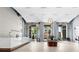 Elegant building lobby with modern reception desk and comfortable seating at 250 Pharr Rd # 1707, Atlanta, GA 30305