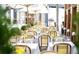 Outdoor patio with tables and chairs, perfect for dining at 250 Pharr Rd # 1707, Atlanta, GA 30305