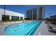 Resort-style pool with plenty of lounge chairs at 250 Pharr Rd # 1707, Atlanta, GA 30305