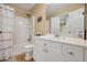 Full bathroom with tub/shower combo and white vanity at 4029 Hill Station Ct, Sugar Hill, GA 30518