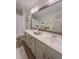 Updated bathroom with double vanity and a large mirror at 4940 Parke Brook Dr, Acworth, GA 30101