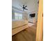King-size bed in a bright and airy bedroom with large window at 4940 Parke Brook Dr, Acworth, GA 30101