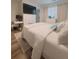 Light and airy bedroom with a comfortable queen bed at 4940 Parke Brook Dr, Acworth, GA 30101