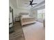 Primary bedroom with king-size bed and neutral decor at 4940 Parke Brook Dr, Acworth, GA 30101