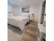 Bright bedroom with a queen bed and wood-look floors at 4940 Parke Brook Dr, Acworth, GA 30101