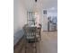 Bright dining room with a large table and chairs, and a view into the kitchen at 4940 Parke Brook Dr, Acworth, GA 30101