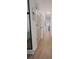 Long hallway with light walls, LVP flooring, and neutral-toned doors at 4940 Parke Brook Dr, Acworth, GA 30101