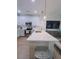 Modern kitchen with white cabinets, stainless steel appliances, and a large island at 4940 Parke Brook Dr, Acworth, GA 30101