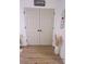 Neat laundry closet with double doors and ample storage at 4940 Parke Brook Dr, Acworth, GA 30101