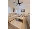 Relaxing living room featuring a neutral sofa, coffee table and hardwood floors at 4940 Parke Brook Dr, Acworth, GA 30101