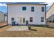 Home's backyard with patio, grill, and grass at 210 Omega Ct, Dallas, GA 30157