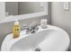 Clean bathroom with a white sink and vanity at 210 Omega Ct, Dallas, GA 30157