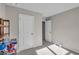 Small bedroom with neutral walls and carpet flooring at 210 Omega Ct, Dallas, GA 30157