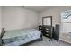 Simple bedroom with double bed, dresser, and mirror at 210 Omega Ct, Dallas, GA 30157
