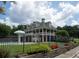 Two-story clubhouse with pool and landscaping at 210 Omega Ct, Dallas, GA 30157