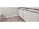 Bathroom with double vanity and neutral tile flooring at 12029 Conrad Circle, Hampton, GA 30228