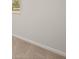 Neutral-colored bedroom with carpeted floors and large window at 12029 Conrad Circle, Hampton, GA 30228