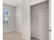 Bright bedroom with neutral wall and carpet at 12029 Conrad Circle, Hampton, GA 30228
