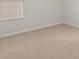 Simple bedroom with neutral wall paint and carpet at 12029 Conrad Circle, Hampton, GA 30228