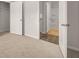 Bedroom with carpet flooring and access to bathroom at 12029 Conrad Circle, Hampton, GA 30228