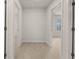 Bright hallway with carpet and access to bedrooms at 12029 Conrad Circle, Hampton, GA 30228