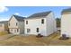 Two-story house with backyard patio and landscaping at 12029 Conrad Circle, Hampton, GA 30228