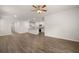Spacious living room with hardwood floors and a ceiling fan at 12029 Conrad Circle, Hampton, GA 30228
