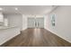 Spacious living room featuring hardwood floors and sliding glass doors at 12029 Conrad Circle, Hampton, GA 30228