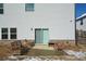 Cozy backyard patio with seating area, adjacent to house and fenced yard at 129 Warbler Way, Mcdonough, GA 30253