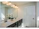 Double vanity bathroom with modern finishes at 129 Warbler Way, Mcdonough, GA 30253