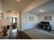 Home office with hardwood floors, a desk, and two framed pictures at 129 Warbler Way, Mcdonough, GA 30253