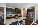 Modern kitchen with granite countertops and stainless steel appliances at 129 Warbler Way, Mcdonough, GA 30253