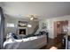 Bright living room with hardwood floors, fireplace and open floor plan at 129 Warbler Way, Mcdonough, GA 30253