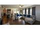 Spacious living area with hardwood floors and an open floor plan at 129 Warbler Way, Mcdonough, GA 30253
