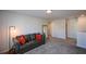 Spacious upstairs hall with gray carpet and two doors at 129 Warbler Way, Mcdonough, GA 30253