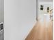 Welcoming entryway with sleek wood flooring and modern digital lock system at 31 Bennett Farm Dr, Loganville, GA 30052