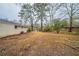 Large backyard with mature trees and open space at 2476 Brentford Pl, Decatur, GA 30032