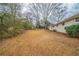 Spacious backyard offering a large grassy area at 2476 Brentford Pl, Decatur, GA 30032