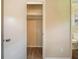 Open closet with wood shelving in bedroom at 2476 Brentford Pl, Decatur, GA 30032