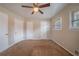 Primary bedroom with ceiling fan and ample closet space at 2476 Brentford Pl, Decatur, GA 30032
