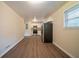 Eat-in kitchen with stainless steel appliances and light wood floors at 2476 Brentford Pl, Decatur, GA 30032