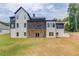 Two-story house with screened porch and large backyard at 4860 Boulder Stone Way, Auburn, GA 30011